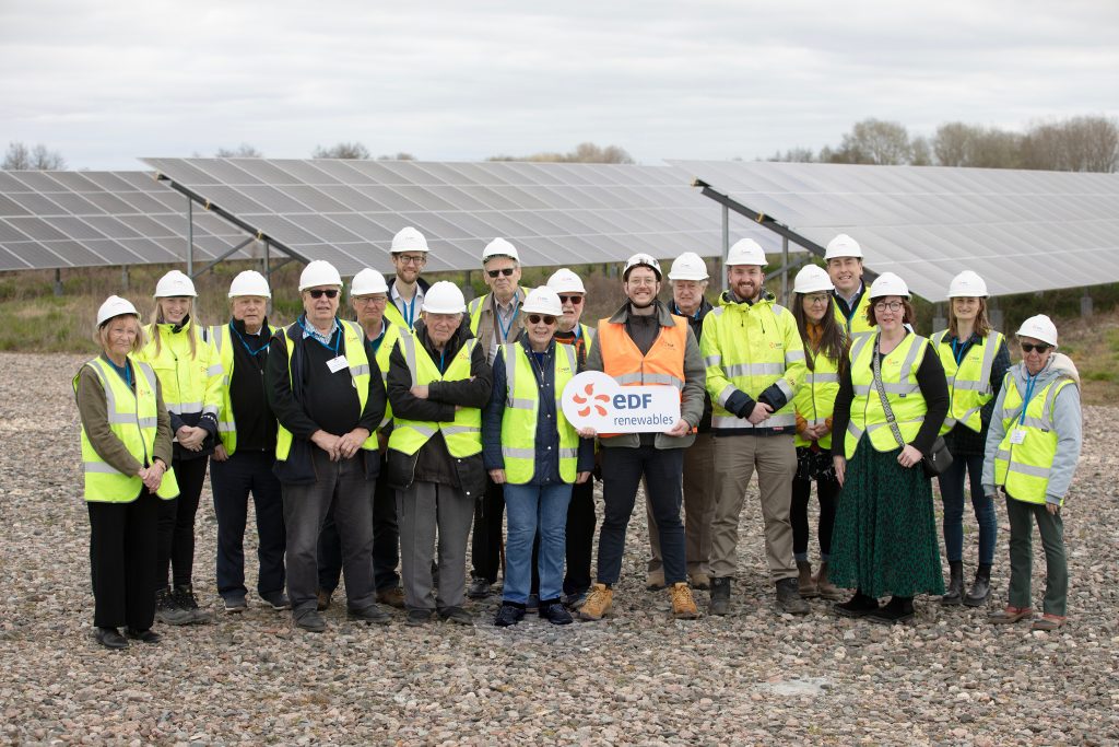A group of people in high vis and hard hats at Sutton Bridge solar farm
